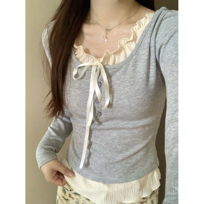 Adult lady wearing a Pure Desire Lace Inner Match Bottoming Shirt in gray with princess sleeves.
