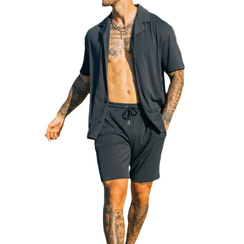 Men's two piece set with short sleeve shirt and shorts in dark color, perfect for casual and stylish looks.