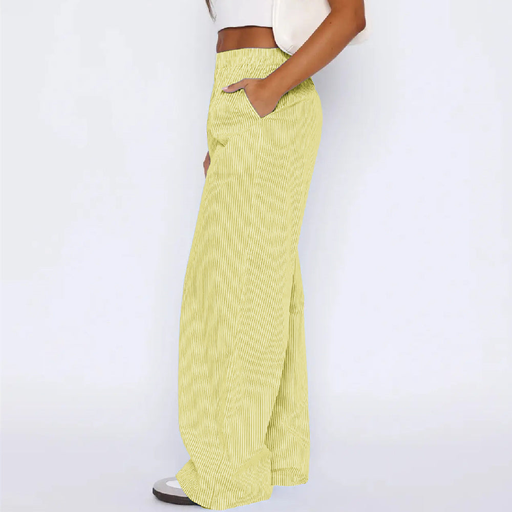 Striped high-waisted trousers with pockets in yellow.