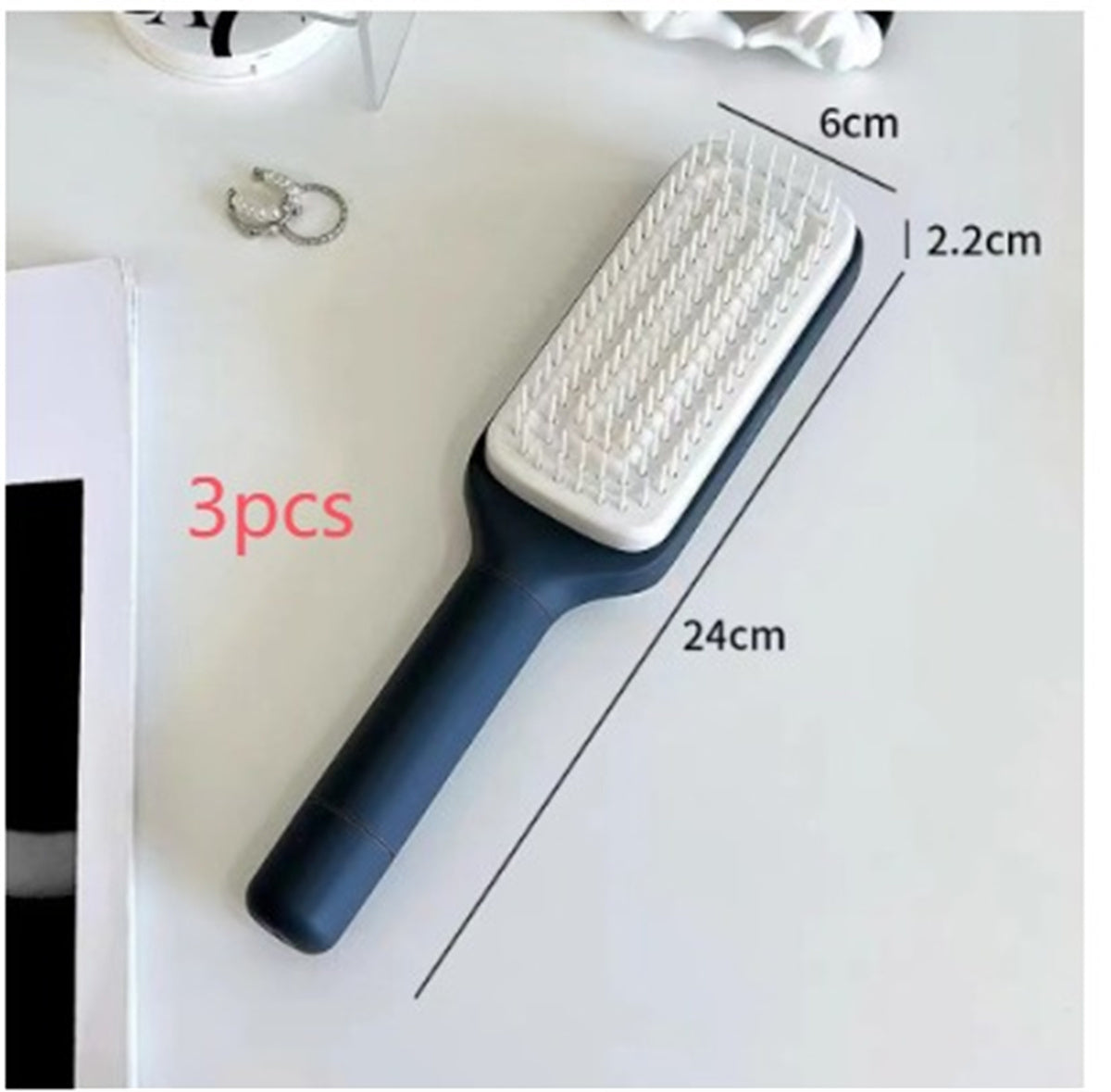 4-in-1-Haarbürste mit Selbstreinigungsfunktion