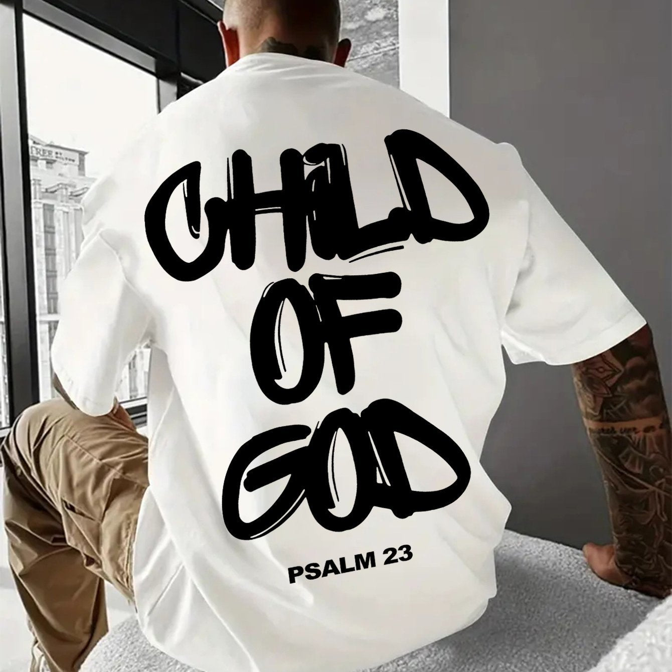Casual and comfortable men's short sleeve shirt with "CHILD OF GOD" print, suitable for youth, available in multiple sizes and colors.