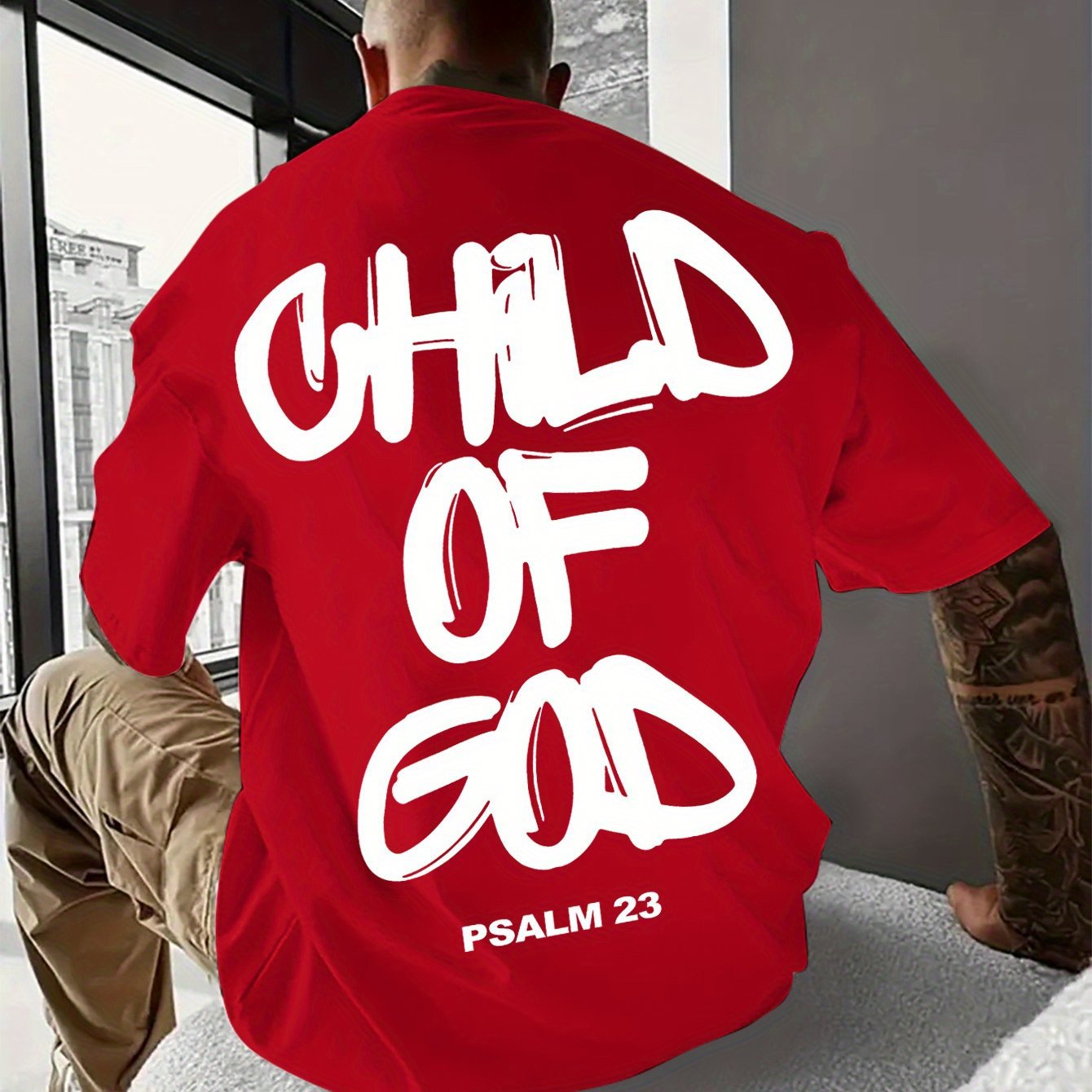 Casual and comfortable men's short sleeve shirt in red with "Child of God" text on the back.