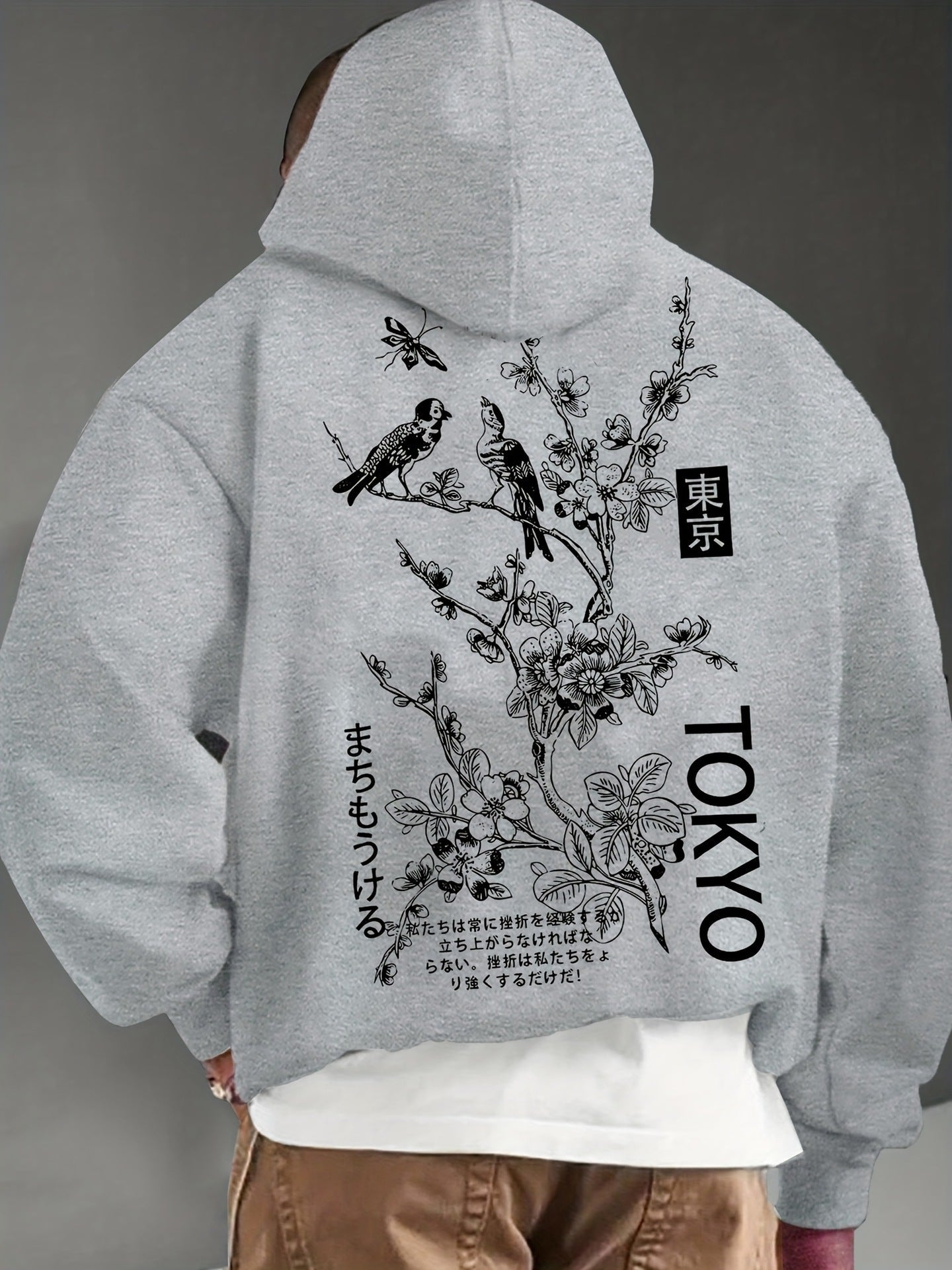 Apricot casual fashion hoodie with floral and bird design, loose fit, polyester fabric.