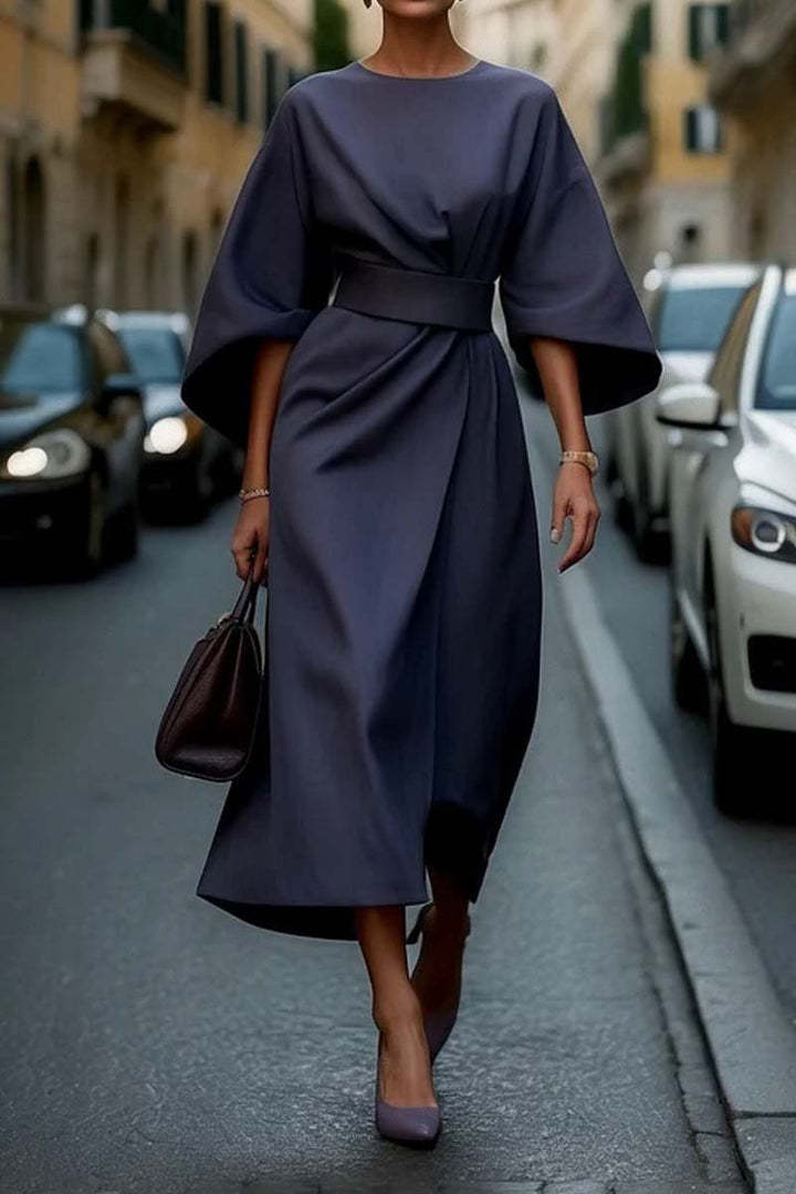 Loose batwing sleeve dress with belt in street fashion style, dark color, polyester material.