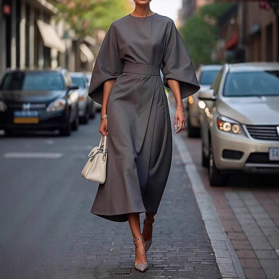Loose batwing sleeve dress with belt, stylish street hipster fashion, polyester fabric.