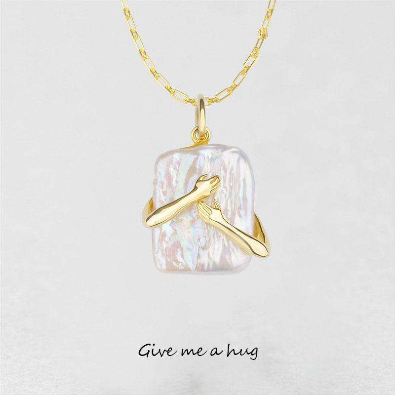 Unique square baroque pearl pendant necklace with gold water wave chain.