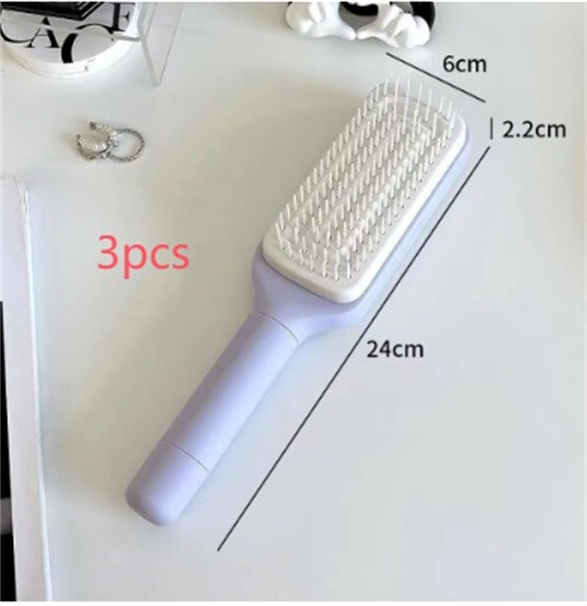 4-in-1-Haarbürste mit Selbstreinigungsfunktion