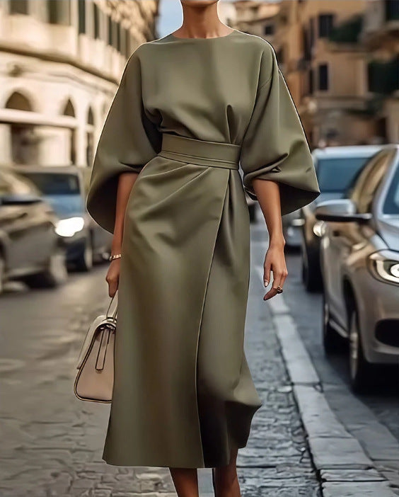 Loose batwing sleeve dress with belt in street hipster style, polyester fabric.