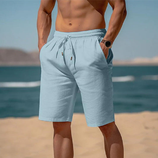 Light blue summer shorts with elastic waist, cotton and linen blend, casual style.