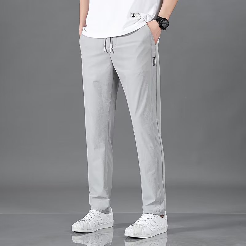 Men's plus size fashion straight pants in light gray with casual fit and elastic waistband.