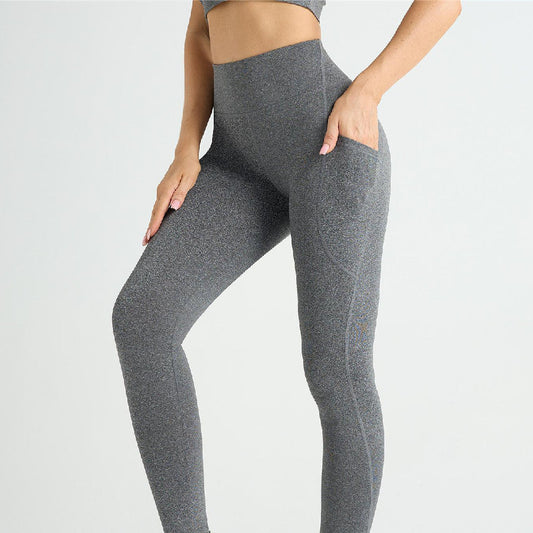 Fashion yoga pants for women in dark gray, high-waisted design, perfect for sports and leisure.