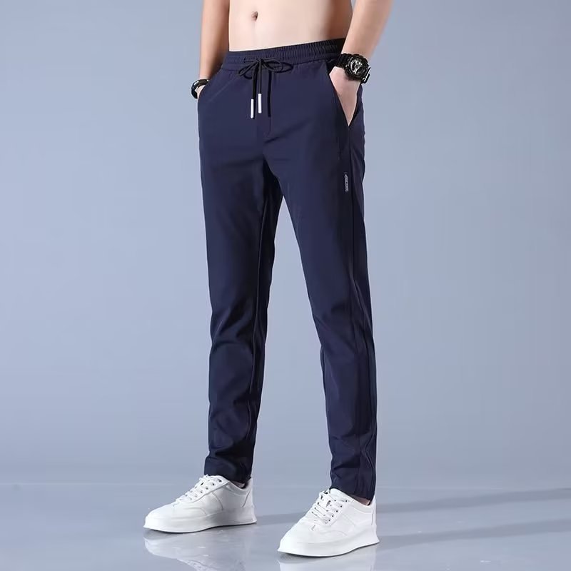Men's plus size fashion straight pants in dark blue, elastic waistband, polyester fabric, suitable for casual wear.