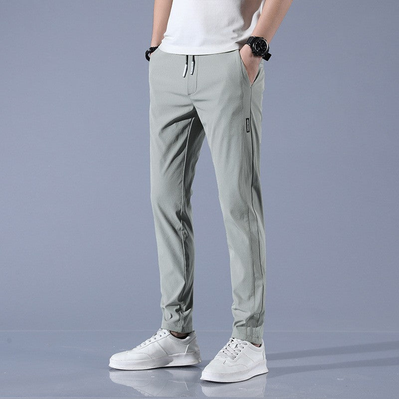 Men's plus size fashion straight pants in light gray, elastic waistband, polyester fabric.