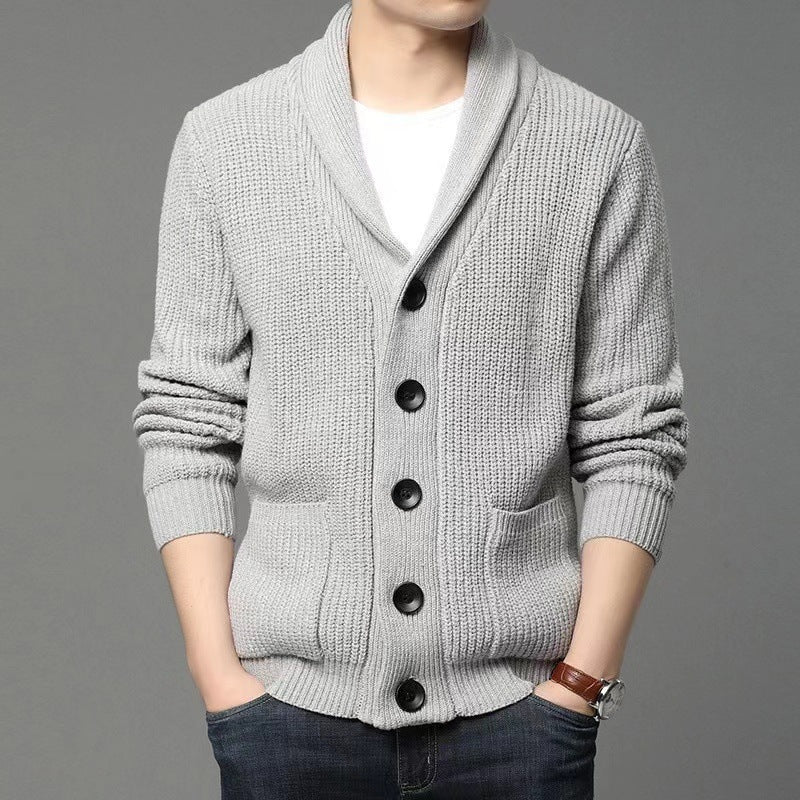 Classic lapel cardigan casual sweater in gray with button closure and pockets.