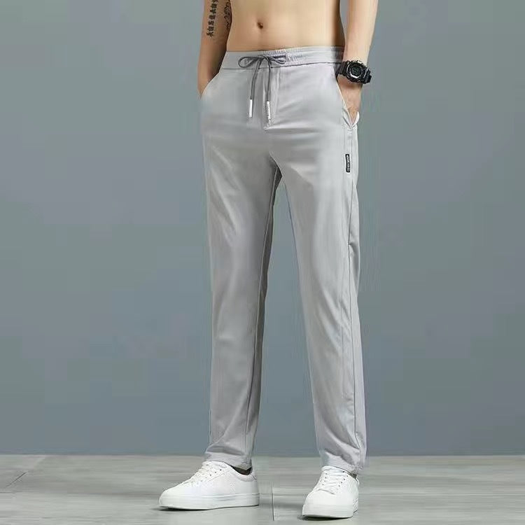Men’s plus size fashion straight pants in light gray with elastic waistband.