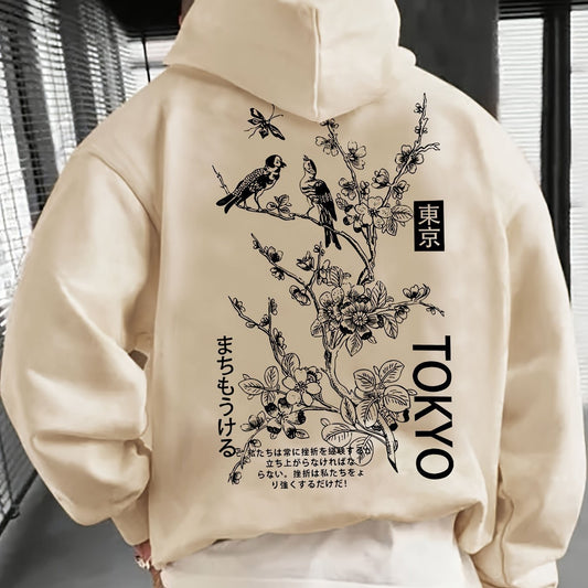 Casual apricot hoodie with floral and bird print, featuring "Tokyo" text on the back.