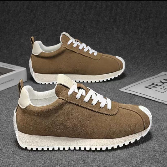 Men's shoes in khaki with a round toe, mesh upper, and white laces on a gray background.