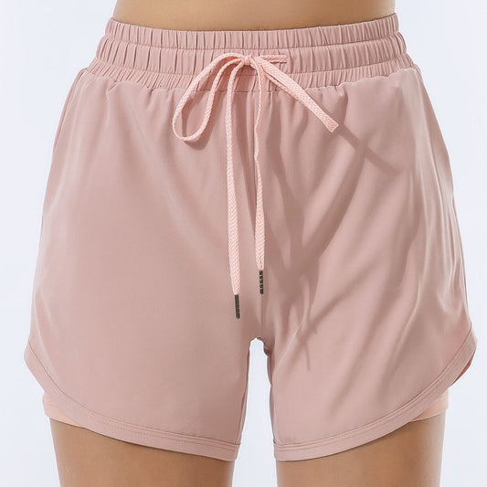 Summer fashion loose sports shorts for women in pink color.