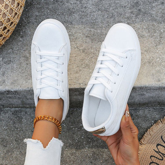 Women's sneakers casual sports white shoes with lace-up design and round toe.