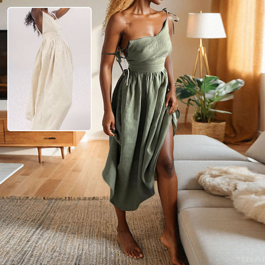 Summer V-neck dress with high waist and sleeveless design, shown in an elegant room setting.
