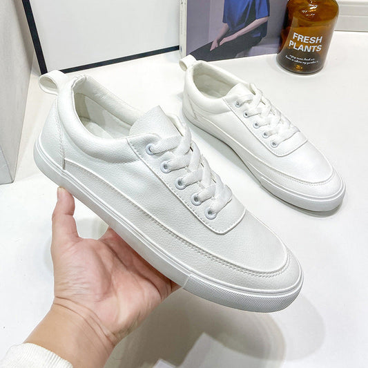 White four seasons breathable men's casual shoes with low top and flat heel.