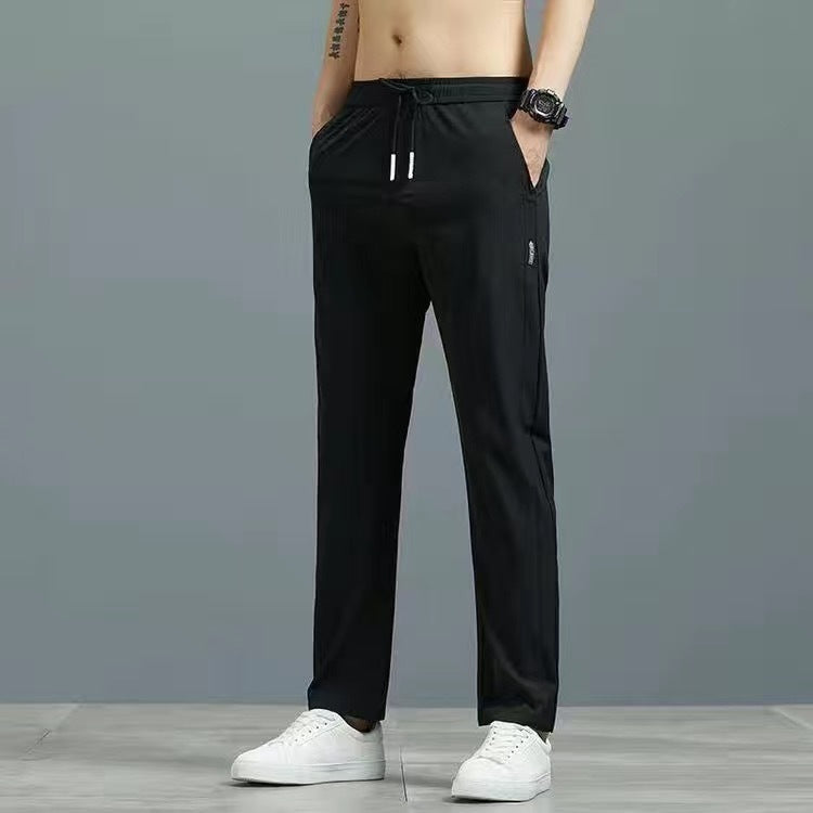 Men's plus size straight fashion pants in black with drawstring waist, suitable for casual wear.